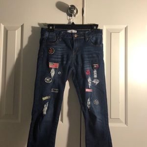 Dark navy blue jeans with cute patch work!